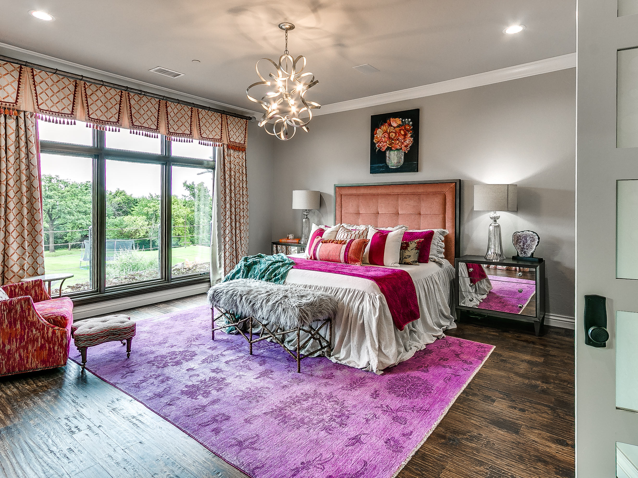 Luxury master bedroom with chandelier