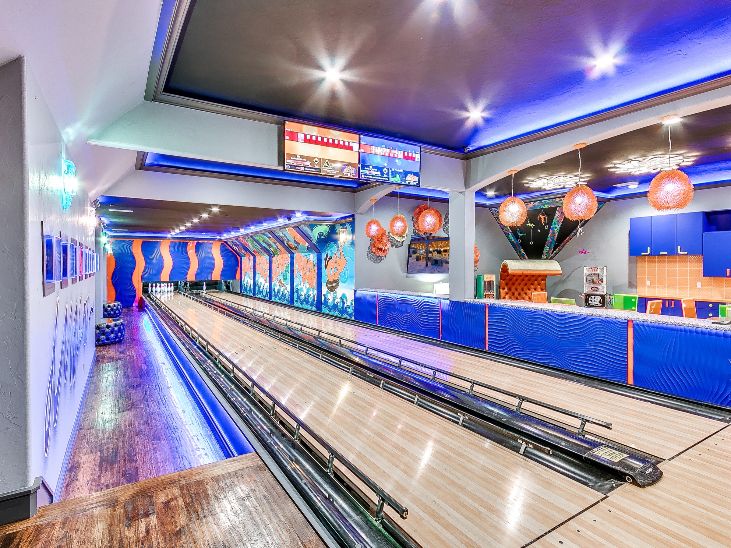 Private bowling alley with custom murals
